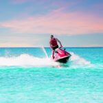 Young,Guy,Cruising,On,A,Jet,Ski,On,The,Caribbean